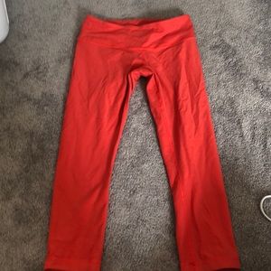 Reddish orange lululemon Mid calf pants